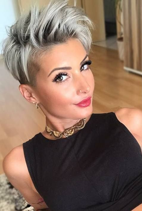 a white lady wearing  pixie short hairstyle for women