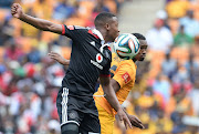 Happy Jele, then captain of Orlando Pirates, and former Kaizer Chiefs star Bernard Parker in a Soweto derby match. Both have started their Caf C licence coaching courses with Safa.