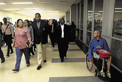 Gauteng premier Nomvula Mokonyane, Gauteng MEC for health Hope Papo and other members of the legislature tour the Charlotte Maxeke Johannesburg Academic Hospital. File photo