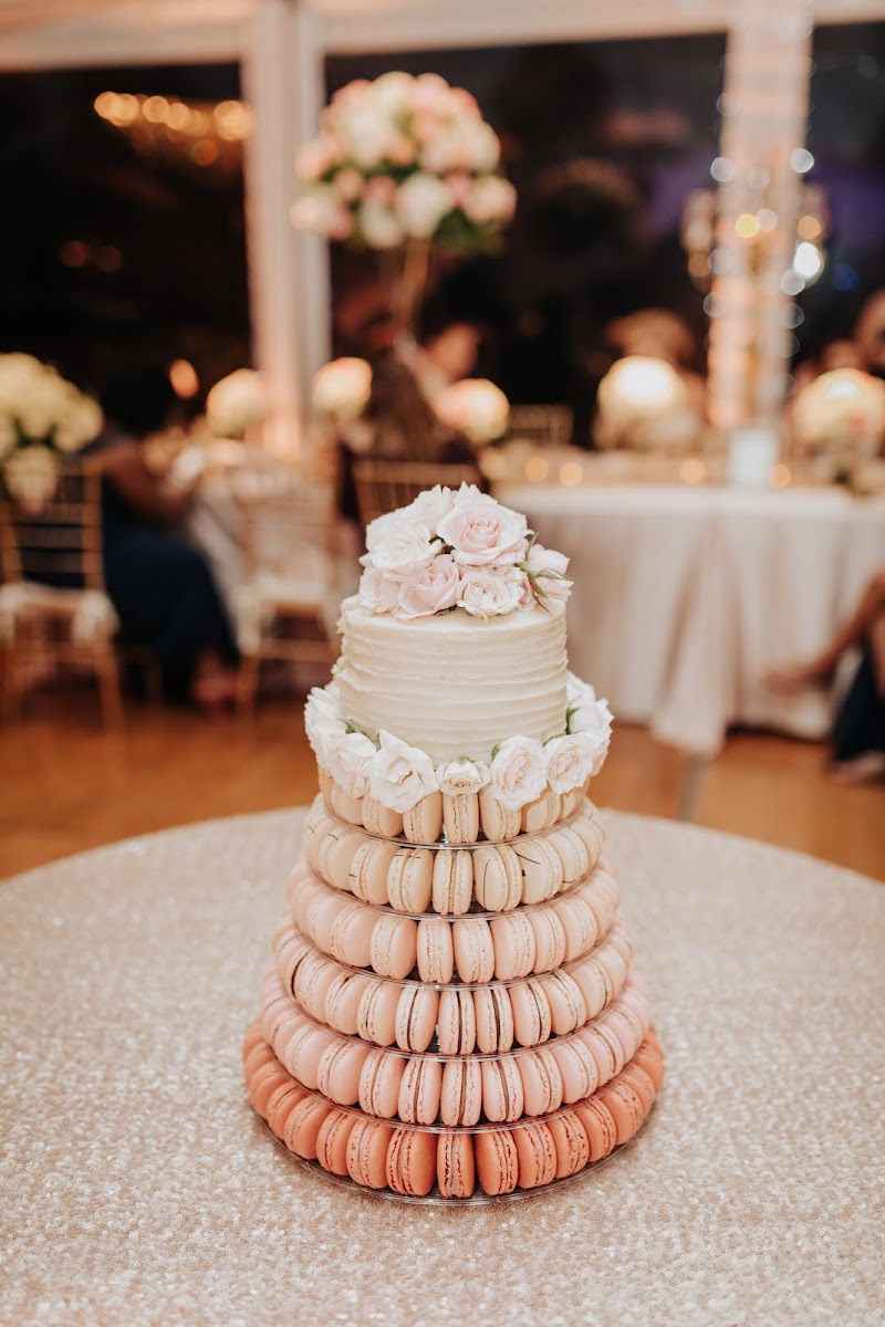 My daughter has a gluten allergy and loves your macarons so she chose them for her wedding cake. They came to the venue and set up the macaron tower. Everyone loved it! (gf cake from Cocoa Bites)