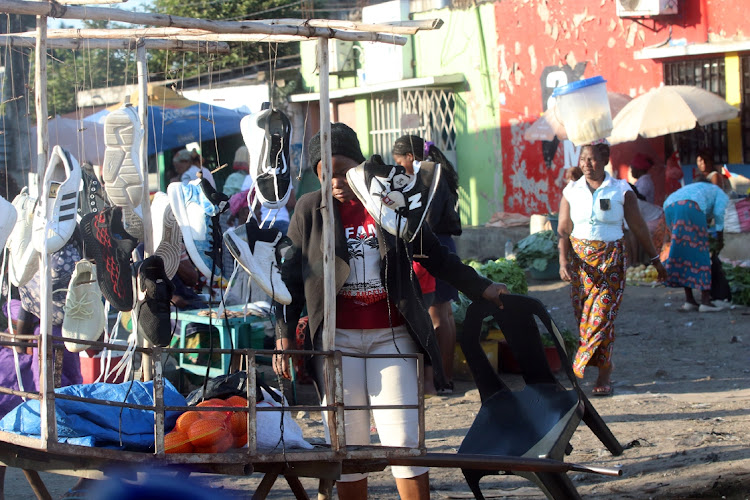 At T3 free Market in Maputo traders sell a diversity of local products at their stalls.