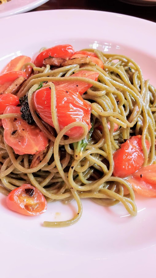 Spaghetti Moringa Alla Checca, organic Khorosan Moringa spaghetti with cherry tomatoes, garlic, chili peppers and basil at Maccheroni Republic in downtown LA offering homemade fresh organic pasta