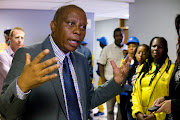 Mayor of Johannesburg Herman Mashaba at Vanin Court in Hillbrow. This building was once owned by the city but it has been hijacked and turned into a slum.