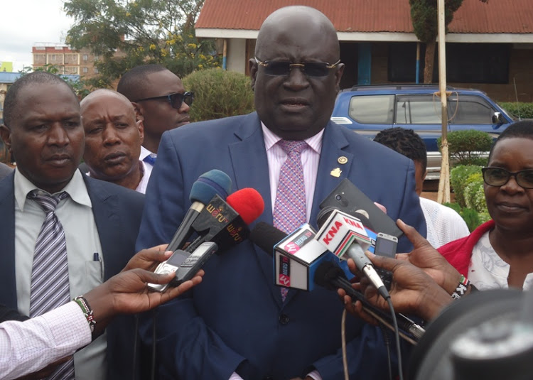 Education Cabinet Secretary Prof George Magoha speaking to the press at Urban Primary School in Embu Town yesterday