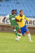 Jeremy Brockie, in yellow, and his Mamelodi Sundowns  teammates are looking to qualify for the group stage of the CAF Champions League should they beat Ahli Benghazi of Libya. /Lefty Shivambu/Gallo Images