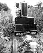 MOTHER'S MOURNING: Martha Mahlangu at the grave of her son in 1993