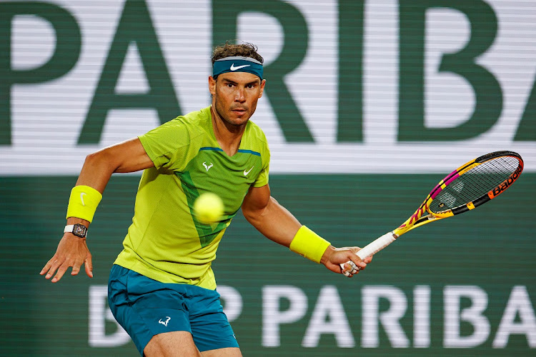 Rafael Nadal of Spain hits a forehand against Corentin Moutet of France in the second round of the French Open at Roland Garros in Paris on May 25, 2022.