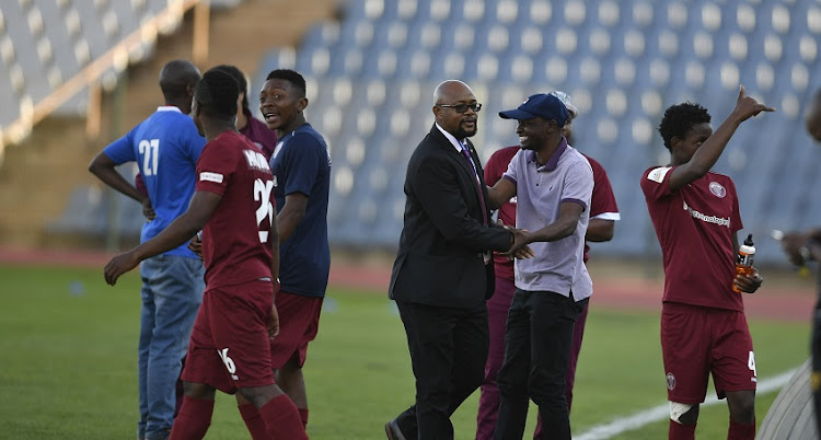 Swallows FC chairman David Mogashoa celebrates with players during the GladAfrica Championship match between Swallows FC and Royal Eagles at Dobsonville Stadium on September 14, 2019 in Johannesburg, South Africa.