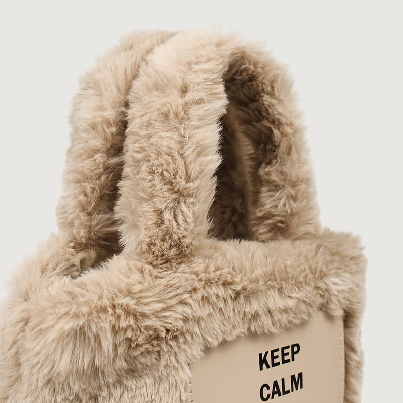 Autumn and Winter New Bucket Handbag Mini All-match. A stylish and versatile mini handbag perfect for any occasion. Carr
