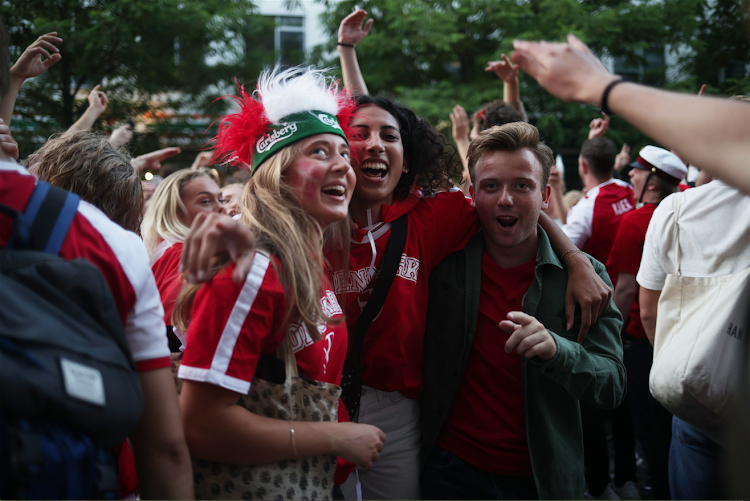 Denmark fans celebrate on the street after the match REUTERS/Hannah Mckay