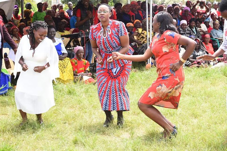 Murang'a Woman Representative Sabina Chege (C) with women at Kimorori grounds on Friday