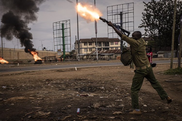 Police fire teargas as people protest after election results were announced on August 15 2022 in Kisumu, Kenya. Picture: GETTY IMAGES/ED RAM