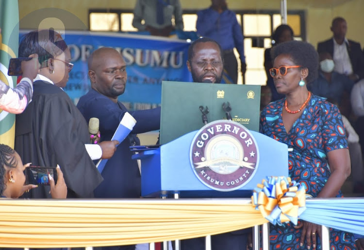 Kisumu Governor Anyang Nyong'o takes an oath office alongside his wife Dorothy at Jomo Kenyatta Sports Ground in Mamboleo, Kisumu on August 25, 2022.