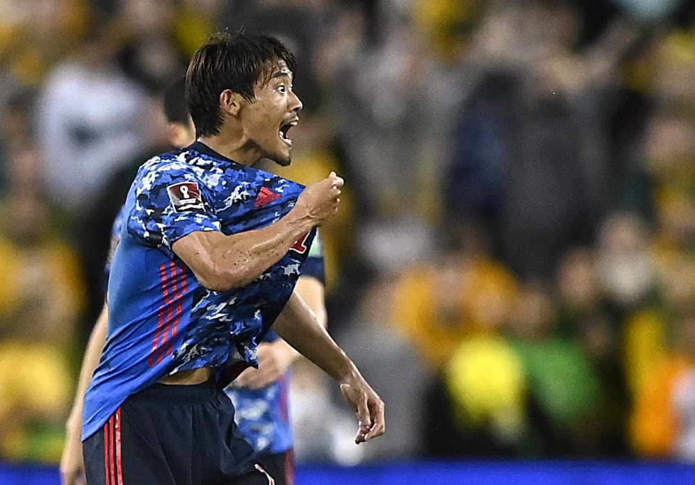 Soccer-Mitoma double sends Japan, Saudi Arabia to World Cup finals