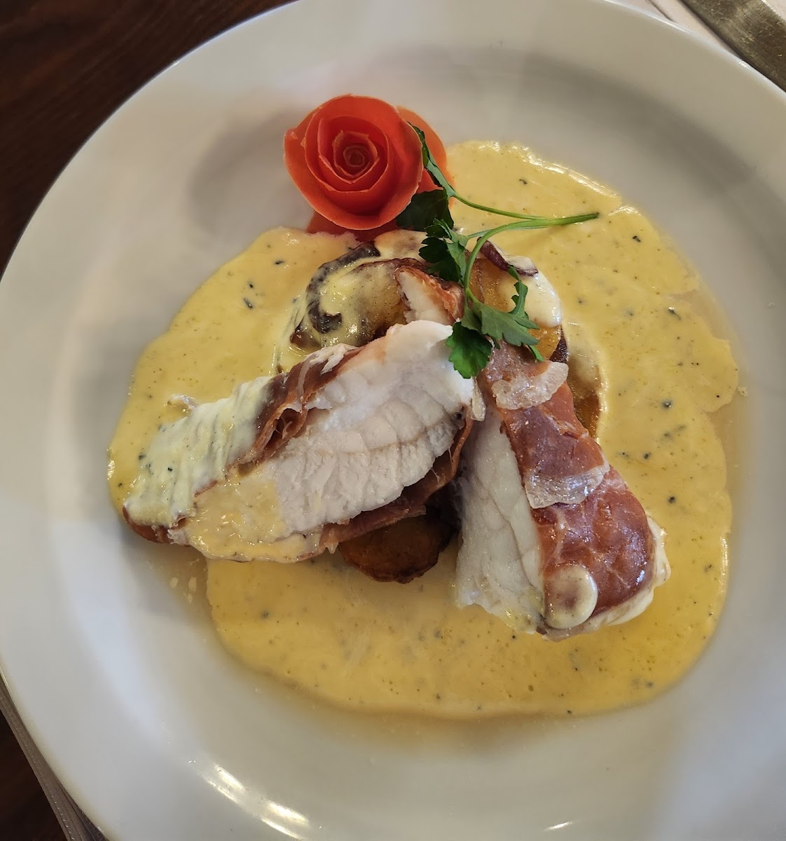 Monkfish in cheese sauce