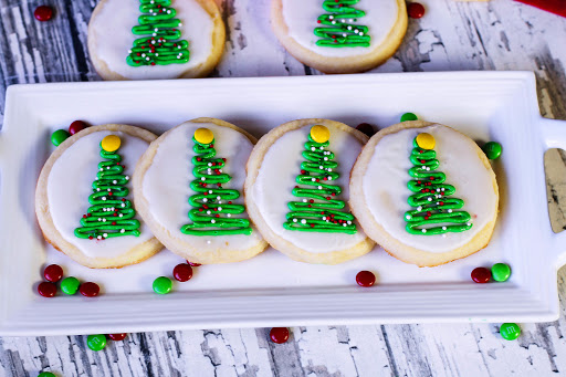 Cream Cheese Sugar Cookies decorated with Christmas trees.