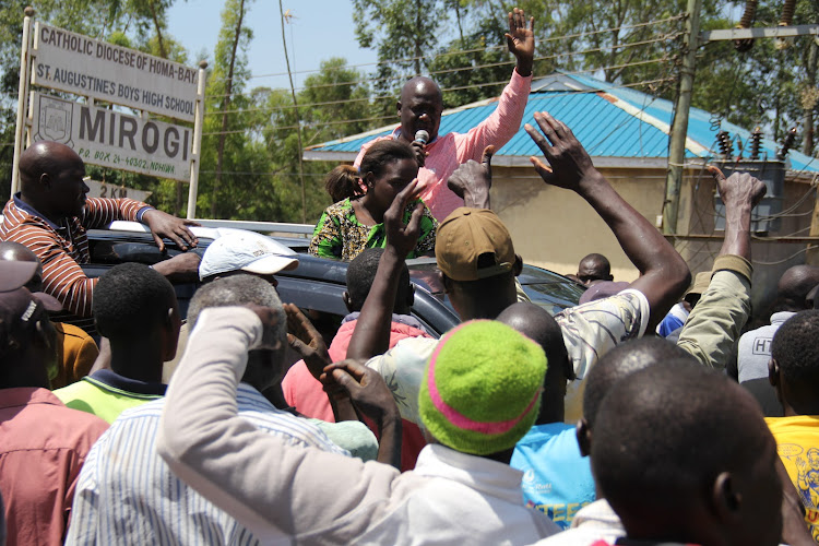 Ndhiwa parliamentary seat aspirant Michael Agwanda in Mirogi market on Monday