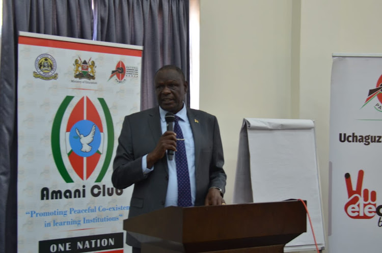 Kenya Secondary Schools Heads Association chairman Indimuli Kahi addresses participants during the opening of a two-day Amani Clubs coordinators' workshop in Machakos on Thursday, February 10, 2022