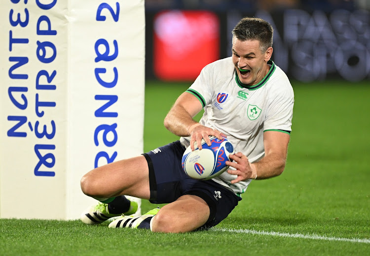 Johnny Sexton scores Ireland's fourth try to become their record points scorer in their Rugby World Cup match against Tonga at Stade de la Beaujoire in Nantes, France on Saturday.