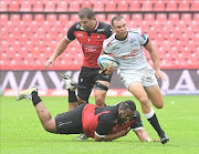 Curwin Bosch of the Sharks leaves Lions players in his wake en route to the opening try at Ellis Park on Saturday. 