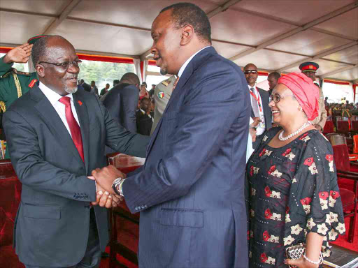 President Uhuru Kenyatta and First Lady Margaret with Tanzanian President Pombe Magufuli during the swearing-in of Uganda's Yoweri Museveni at Kololo Independence grounds in Entebbe, May 12, 2016.