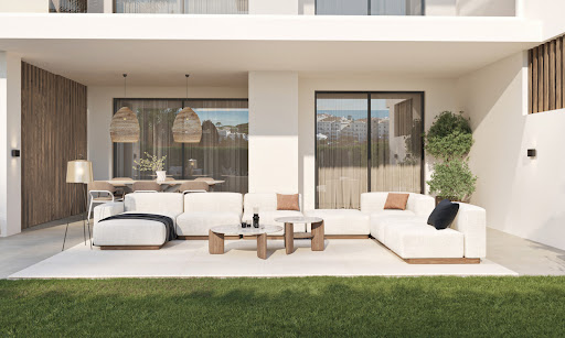 Modern outdoor living room with white sofa in this luxury apartment / penthouse for sale in Estepona ($1,313,039 - 223 m²)