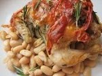 Cornish Game Hens with Prosciutto and Rosemary with White Beans was pinched from <a href="http://www.seriouseats.com/recipes/2012/12/prosciuotto-and-rosemary-cornish-game-hen-beans-recipe.html" target="_blank">www.seriouseats.com.</a>