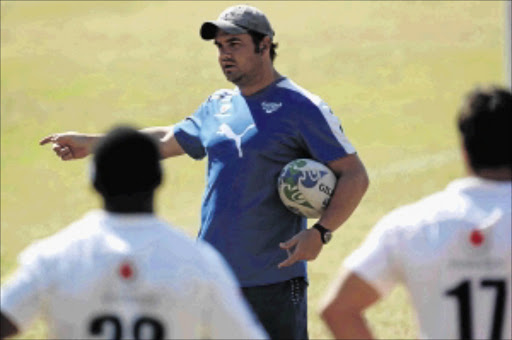 SETTING THE SCENE: Bulls coach Pine Pienaar talks to his team during a training sessionphoto: Lee Warren/Gallo Images