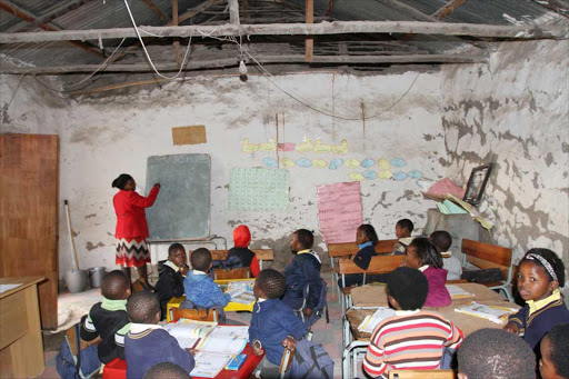 DAILY STRUGGLE: Pupils at Lower Ntlaza Junior Primary in Ntlaza near Libode, still have to study in mud classrooms Picture: SINO MAJANGAZA