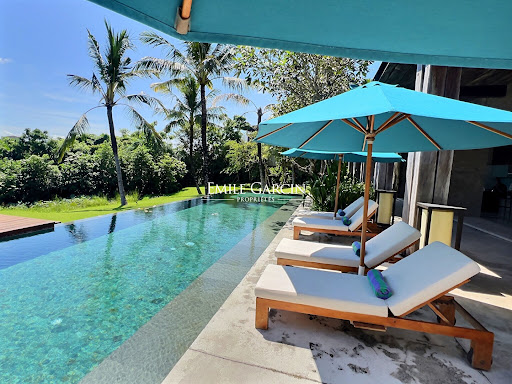 Luxury vacation rental property in Basly (14610) - Swimming pool with lounge chairs and umbrellas