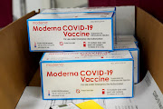 Boxes containing the Moderna Covid-19 vaccine are prepared to be shipped at the McKesson distribution center in Olive Branch, Mississippi, US December 20, 2020. 