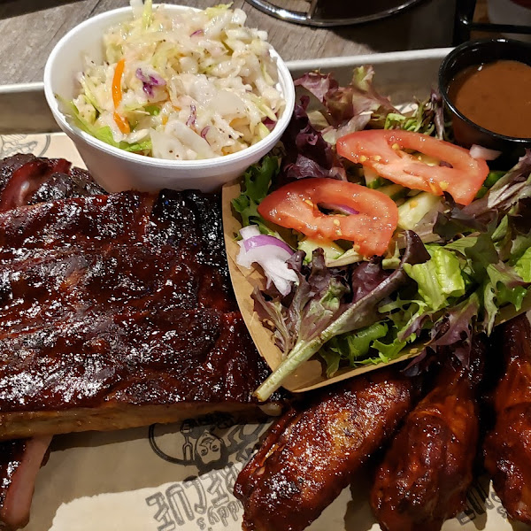 Ribs, wings, salad, slaw