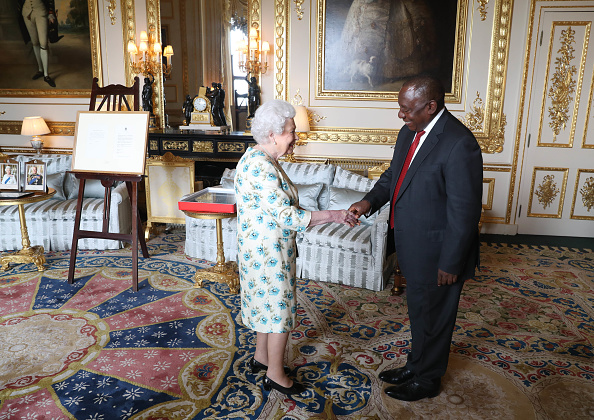Queen Elizabeth shows President Cyril Ramaphosa letters between her and Nelson Mandela on SA returning to the Commomwealth which was presented as a gift to him during an audience at Windsor Castle on April 17 2018 in Berkshire, England. Picture: GETTY IMAGES/WPA POOL/STEVE PARSONS