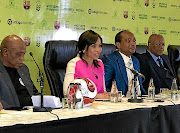 Mining magnate Patrice Motsepe with his wife Precious, flanked by Tokyo Sexwale, left, and Jeff Radebe.