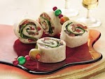 Greek Salad Pinwheels was pinched from <a href="http://www.recipe.com/greek-salad-pinwheels/" target="_blank">www.recipe.com.</a>