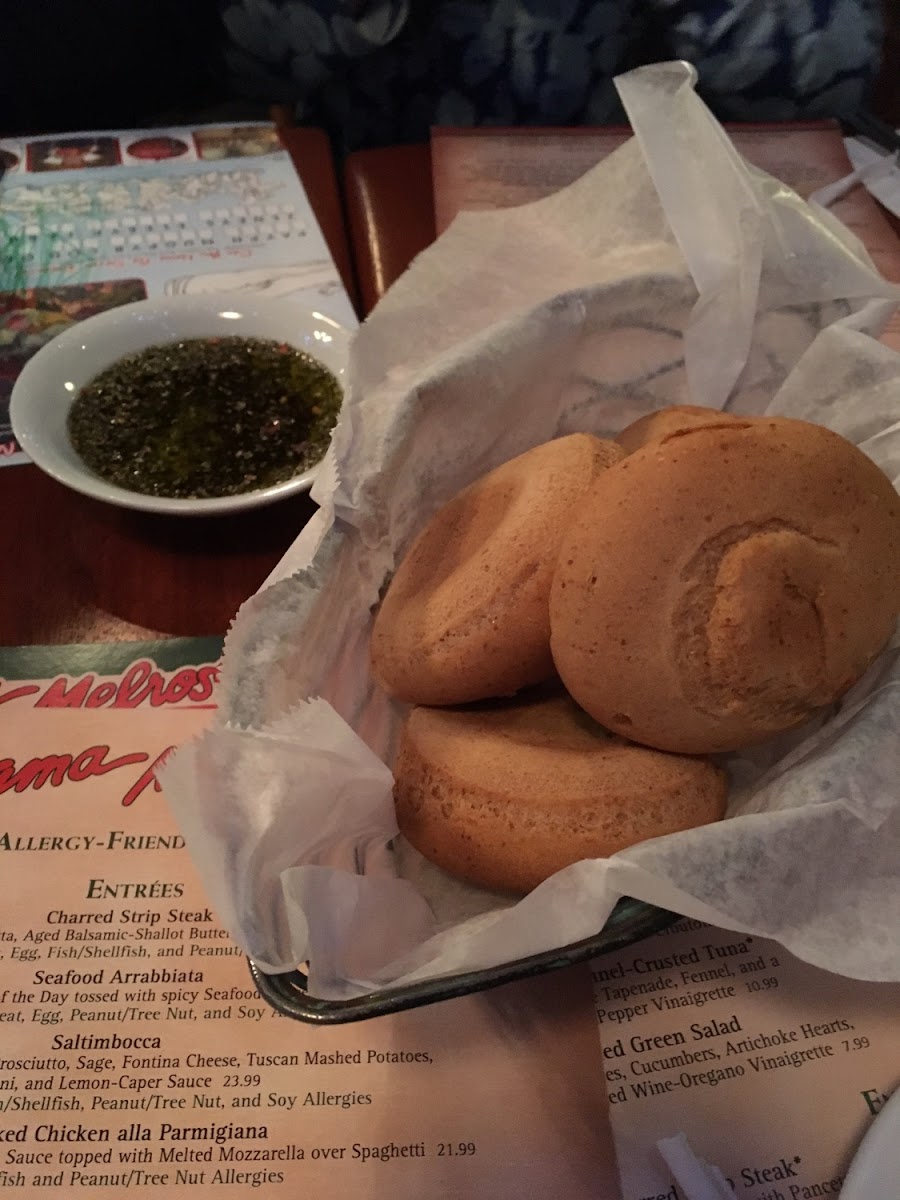 Basket of gluten free rolls and olive oil with spices to dip them in.  2/2016