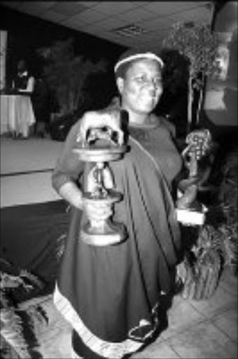 DELIGHTED: Makgoro Mannya of the Ditubatse Business Enterprise in Tzaneen was the overall winner of the Limpopo 2007 Female Farmer of the Year award. Pic. Alex Matlala. 29/08/07. © Sowetan.