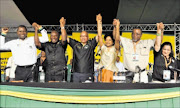 TOP GUNS: The ANC's top six leaders Zweli Mkhize (treasurer),  Cyril Ramaphosa  (deputy president), Jacob Zuma, (president),  Baleka Mbete, (chairperson),  Gwede Mantashe (secretary-general) and  Jessie Duarte (deputy secretary-general) after their election. 
         PHOTO: ELMOND JIYANE