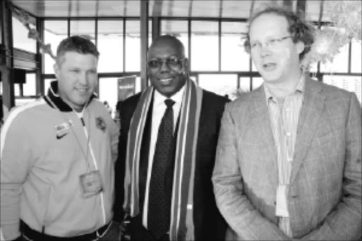 STRONGEST LINK: MEC for economic development and tourism Mike Mabuyakhulu with Janssen Jeroen, right, of Netherlands and Ruben Berents of Belgium. Pic. THULI DLAMINI. 18/06/2010. © Sowetan.