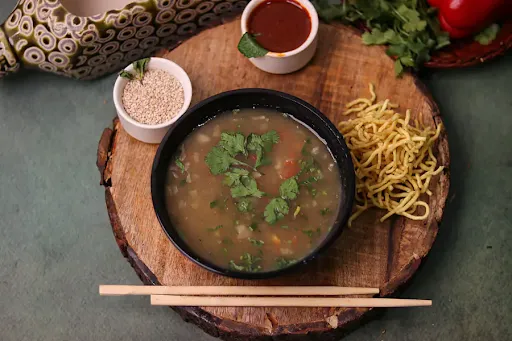 Chicken Manchow Soup With Fried Noodles