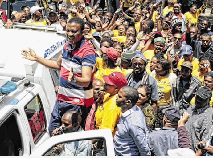 Andile Lili, who lead the poo protests in 2014, has been found guilty of incitement to commit murder.