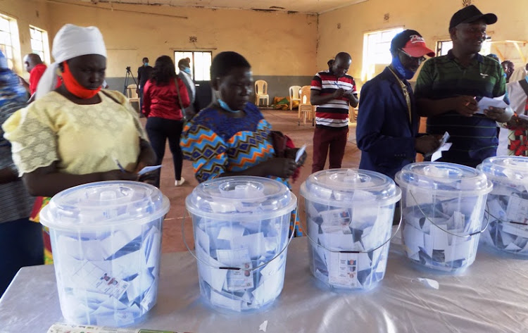 Embu County Government Workers' Union members cast their votes during the union's elections at Embu town social hall