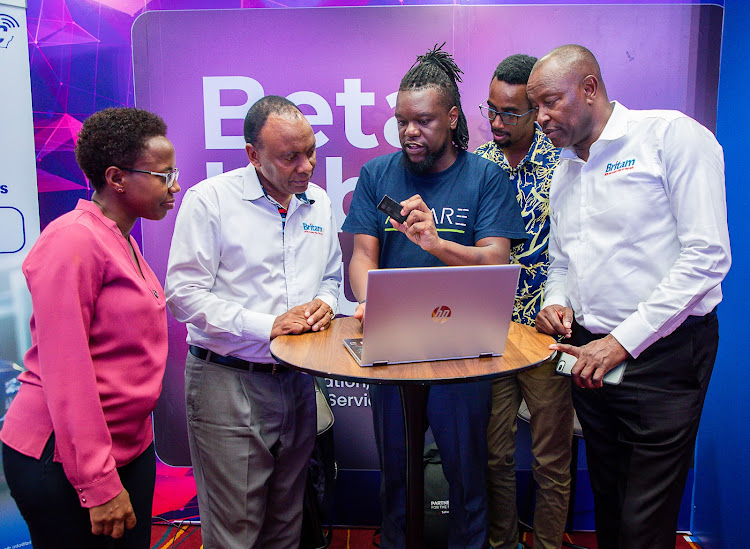 From left Britam Director Partnerships & Digital Evah Kimani, Britam GMD & CEO Tom Gitogo, AiCare Co-founder and CEO Arthur Mulwa, AiCare Head of Engineering Peter Chege and Britam Board Member Julius Mbaya at the BetaL.