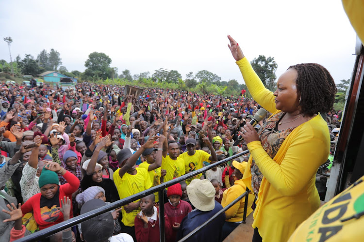 Kirinyaga Governor Anne Waiguru addresses Karumandi ward residents during a campaign event.