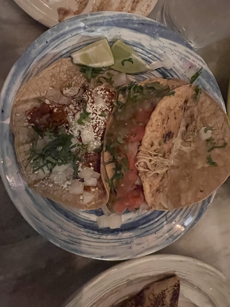 Cheesy crunch and carnitas (chicken) tacos