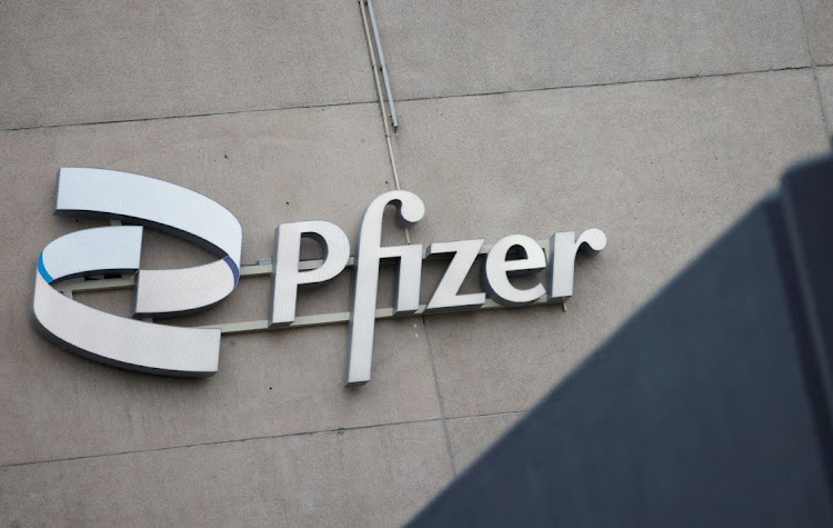 Pfizer company logo is seen at a Pfizer office in Puurs, Belgium, December 2, 2022.