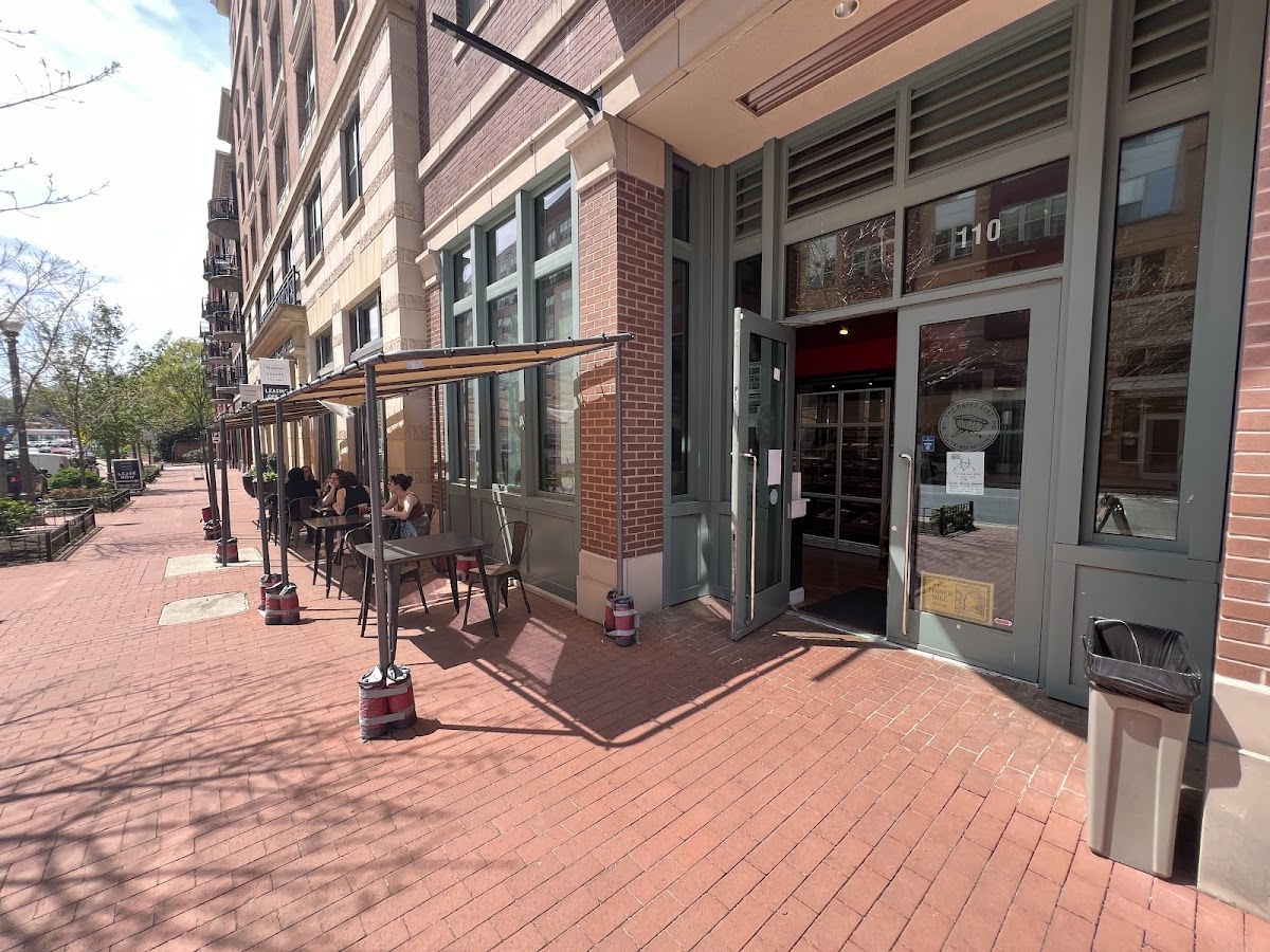 Front door and outdoor seating.