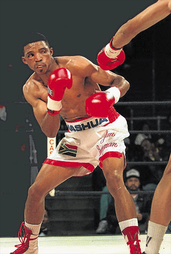 TAKING BLOWS: WBU welterweight champion Jan Bergman fights at Nasrec back in 1997.