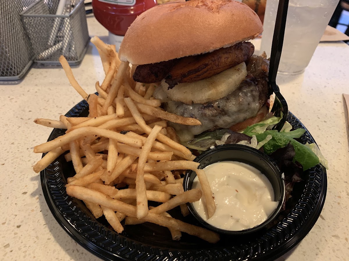 Burger with GF bun, plantains, pineapple and various accoutrements. Shoestring fries were very tasty with the garlic aioli!