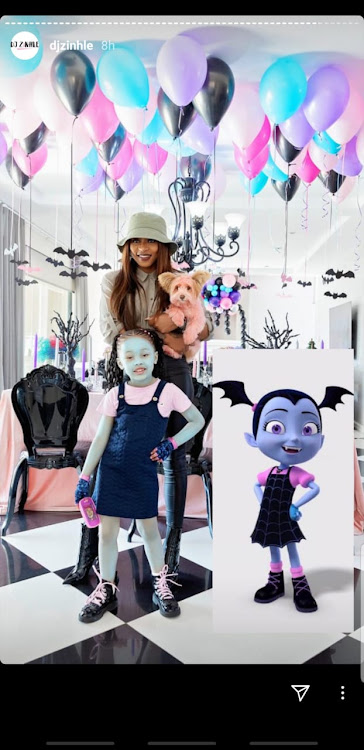 Kairo Forbes dressed up as Disney's 'Vampirina', posing with mom DJ Zinhle and dog Kleo